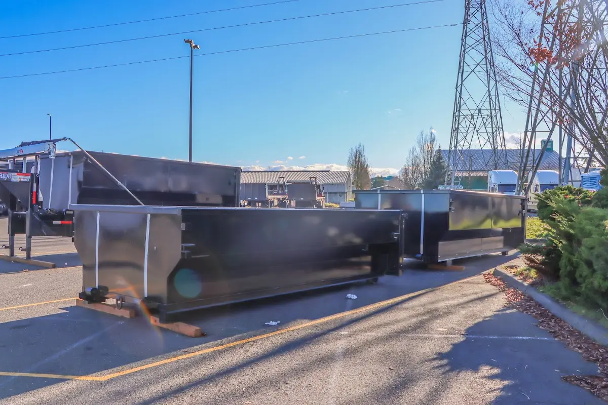 Roll-off dumpster ready for waste disposal at job site for Roofing Dumpster Rental in Lynchburg, Moore County